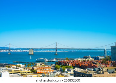 Day Time View Of San Francisco's Bay Bridge And The Downtown Ferry Building Area.