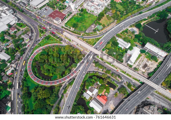 Day traffic circle road with car and green tree look\
down view