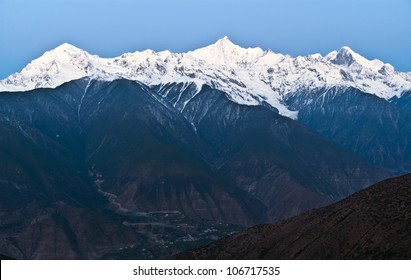 The daybreak of Meili(Meri) Snow Mountains. The photo is the Kawagebo and two other peaks in Meili Snow Mountains. The glacier in the photo was called Mingyong glacier. Taken in the Deqin of Yunnan.