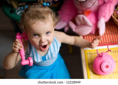 Daycare - Baby Girl Talking By Toy Phone