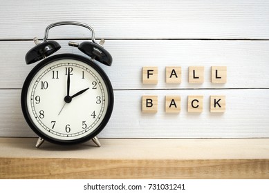 Daylight Saving Time / Fall Back Wooden Letters - Shutterstock ID 731031241