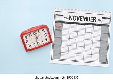 Daylight Savings Time Clock And  November 2020 Calendar On Light Blue Background