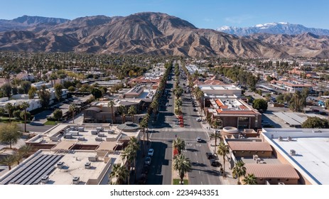 Daytime aerial view of the urban downtown area and mountains of Palm Desert, California, USA. - Powered by Shutterstock