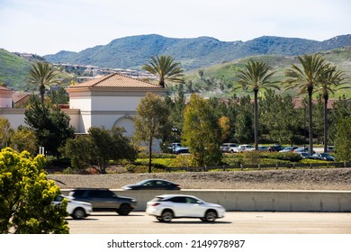 Daytime Palm Framed View Of The Orange County Downtown Skyline Of Irvine, California, USA.