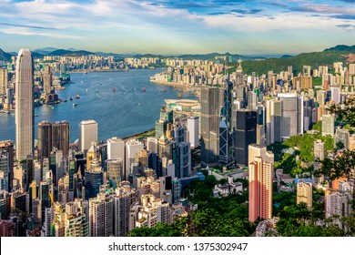 Daytime View Of Hong Kong’s Skyline, Victoria Harbour And Kowloon Bay From Lugard Road, Victoria Peak, Hong Kong Island.