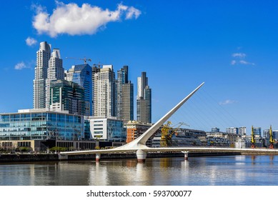 Daytime view at the waterfront in Puerto Madero with the Puente de la Mujer, Buenos Aires, Argentina.