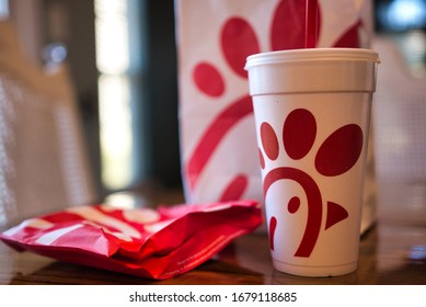 Dayton, OH- Mar 16, 2020; Chick Fil A Food Item Flat Lay On Wooden Table