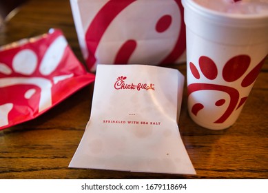 Dayton, OH- Mar 16, 2020; Chick Fil A Food Item Flat Lay On Wooden Table