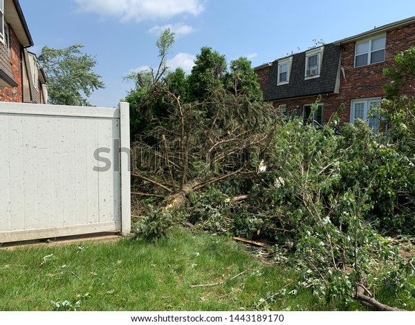 Dayton, OH- May 27, 2019: Aftermath of Memorial Day\
Tornados in Beavercreek. Damage includes uprooted trees, down\
signs, broken down walls, building destroyed. Widespread damage.\
straight line winds