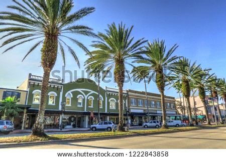 Daytona Beach Florida Downtown Business District and Row of Evenly Spaced Palm Trees in the Center Median