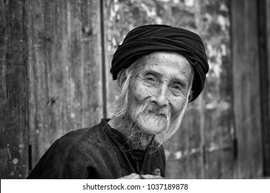 Dazhai, China - August 4 ,2012: Portrait Of An Old Chinese Man In The Village Of Dazhai In China, Asia