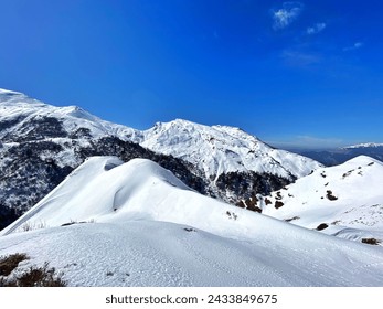 Dazzling white snow covered mountains at The Himalayas, India - Powered by Shutterstock