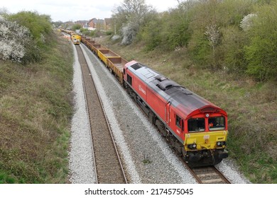 A DB Schenker Class 66 Freight Train Runs On Tracks On April 10, 2021 In Staverton, UK.