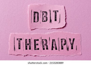 DBT therapy written on paper notes. Dialectical Behavior Therapy psychological treatment concept.