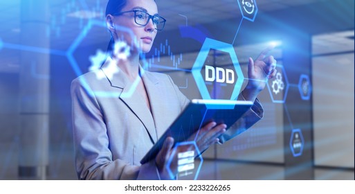 DDD Domain-driven design development concept. Young business woman pressing button on virtual screen. - Shutterstock ID 2233226265