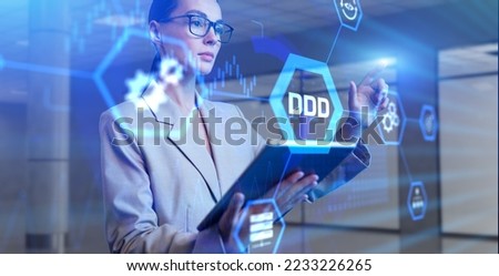 DDD Domain-driven design development concept. Young business woman pressing button on virtual screen.