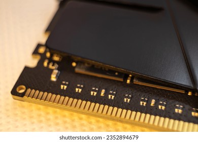 DDR4 DRAM memory module golden electrical contact macro. Computer RAM chip close-up. Desktop PC memory parts