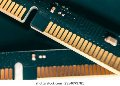 DDR4 DRAM memory module golden electrical contact components macro. Computer RAM chip close-up. Desktop PC memory parts for assemble