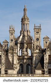 The Château De Chambord In Chambord, Centre-Val De Loire, France, Under A Blue Sky, With Its French Renaissance Architecture And Traditional French Medieval Forms, A View Of One Of Main Tower