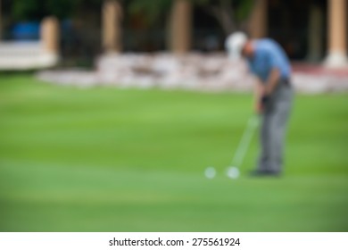 De Focused Or Blurred Man Figure Playing Or Driving Golf On Green Background