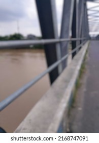 De Focused Of One Side Of The Bridge That Crosses The Bengawan Solo River.