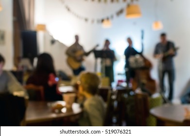 De Focused Photo Of Concert Band Playing In Country Style Music In Cozy Cafe.