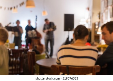 De Focused Photo Of Concert Band Playing In Country Style Music In Cozy Cafe.