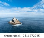 A deactivated lighthouse stands on Tillamook Rock off the rugged coast of northern Oregon. Originally commissioned in 1878, the remote lighthouse eventually earned the name "Terrible Tilly."