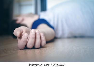 The Dead Body Of A Man Lies On The Floor