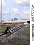 Dead End Buffer stop, bumper, bumping post, bumper block, Train stopper, Train bumper or stopblock at a railroad track.  Installed  for prevent train moving without controlling.  With selective focus.