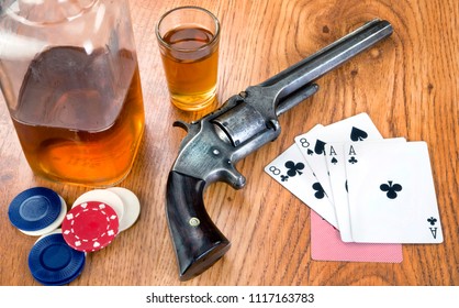 Dead mans hand aces and eights with Wild Bill's six shooter.