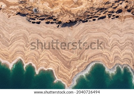 Dead Sea coastline and unique terrain, Aerial view.