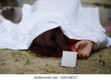 Dead Woman Lay Down Under Bag Covered Death Body From Accident Or Murder At House Of Victim With Evidence. Horror Scene For Halloween. Rape And Murder Case Scene. 