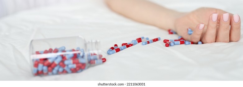 Dead Woman Lying On Bed With Scattered Medical Capsules Closeup