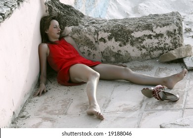 Dead Woman Lying On The Ground