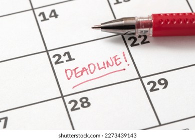 Deadline reminder written on calendar in red marker - Shutterstock ID 2273439143