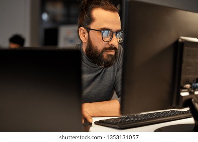 Deadline, Technology And People Concept - Close Up Of Creative Man In Glasses Working At Night Office And Thinking