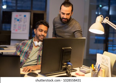 Deadline, Technology And People Concept - Creative Team With Computers Working Together Late At Night Office