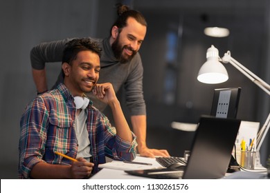 Deadline, Technology And People Concept - Creative Team With Computers Working Together Late At Night Office