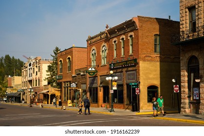 DEADWOOD, SD, USA - SEPTEMBER 15, 2020: Old Hotels, Saloons, And Other Attractions Bring Visitors To Historic Main St. In This Black Hills Gold Rush Town, Famous For Outlaws And Colorful Characters.