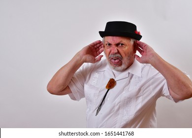 Deaf Old Man Gestures That He Can't Hear
Elderly Gentleman Gesturing He Missed Part Of A Conversation  
Senior Man Suffering From Hearing Impairment  
Hearing Impaired Old Man Making A Crazy Face  