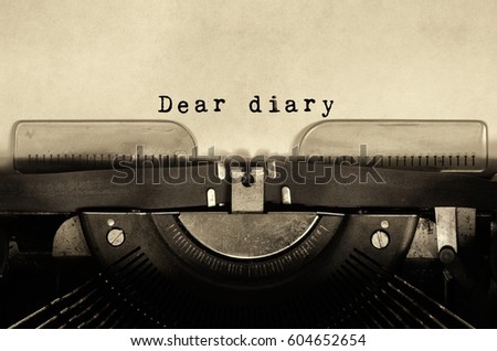 Dear diary words typed on vintage typewriter.