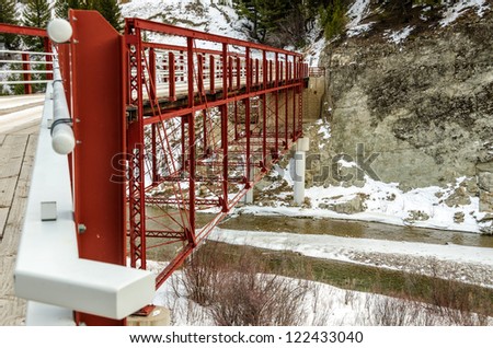 The Dearborn River High Bridge, built in 1897 and restored in 2003, is the last example of a pin-connected Pratt half-deck truss bridge in the United States.