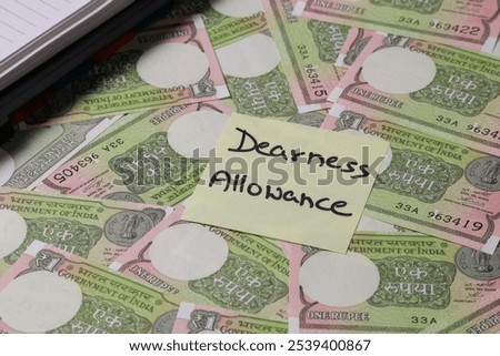 Dearness Allowance message on One rupee notes. paper note of One Rupee. One rupee paper note background. Indian Currency. Indian Currency Note. Dearness allowance changes frequently
