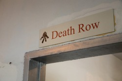 Death Row Sign Above A Door