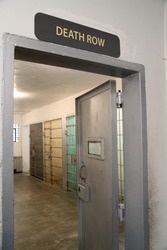 Death Row Sign And A Cell Block At A Prison