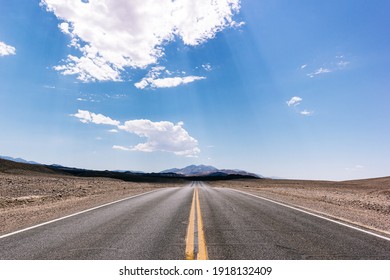 Death Valley, California. Lonely Highway Through The Desert