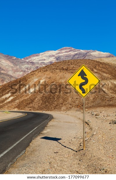 Death Valley, California. Road in the middle of\
the desert
