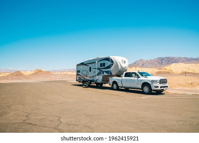 Death Valley National Park, CA, USA - April 15, 2021  Death Valley Road Trip, Camper Trailer In Desert. Harmony Borax Works Viewpoint