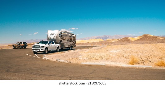 Death Valley National Park, CA, USA - April 15, 2021  Death Valley Road Trip, Camper Trailer In Desert. Harmony Borax Works Viewpoint